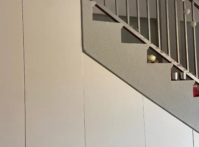 Acogedor En * دينايا